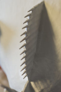 The gaps between the skewers and the two paper sides are filled.